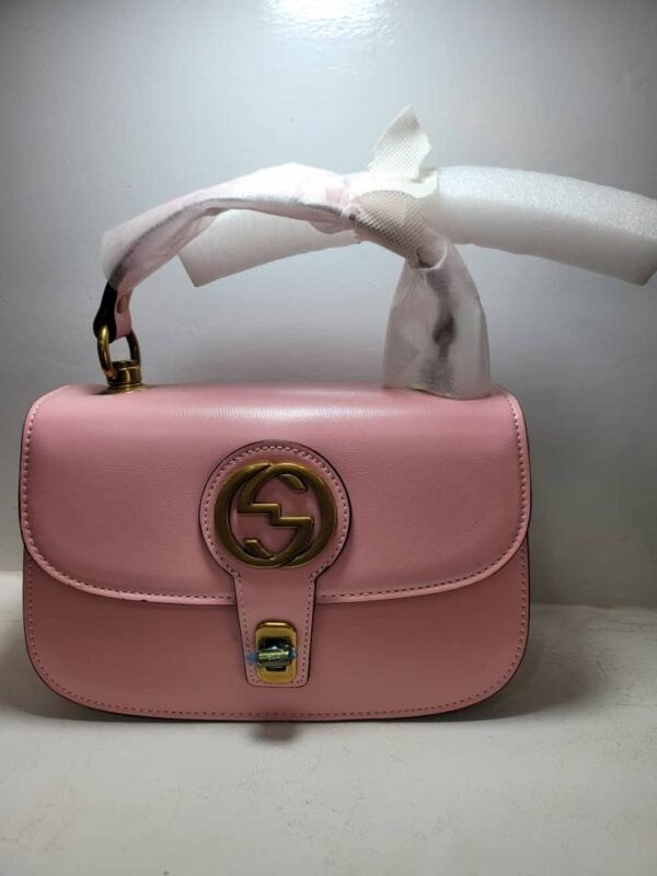 Sac à rabat iconique rose poudré